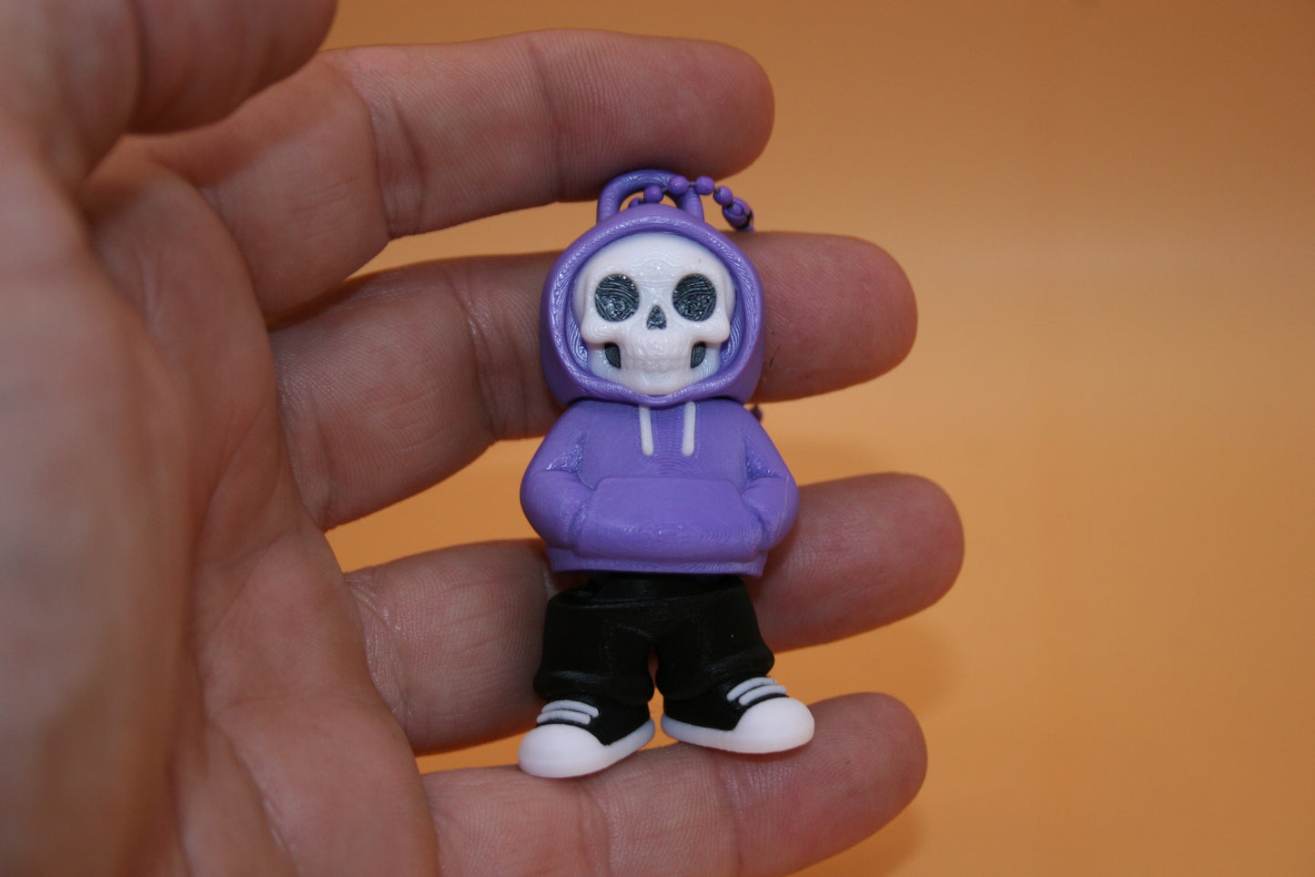 Playful Skelly in Hoodie Keychain