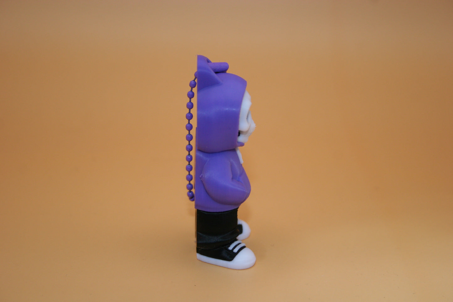 Playful Skelly in Hoodie Keychain