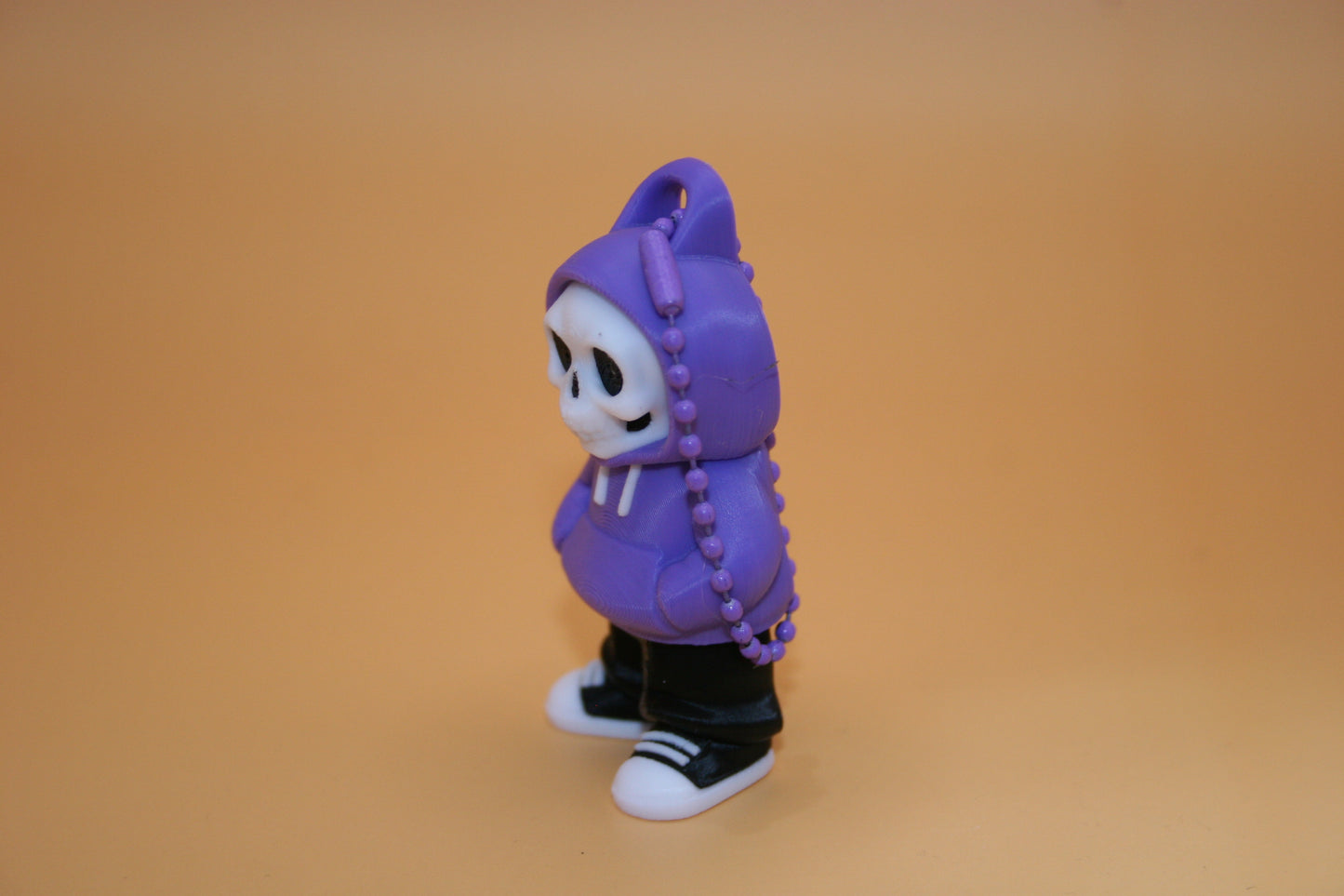 Playful Skelly in Hoodie Keychain