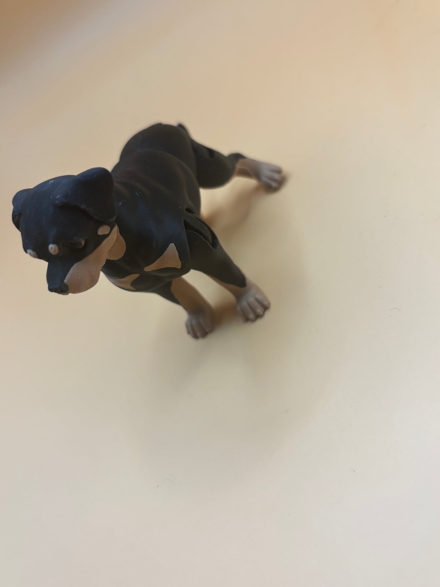 Rottingly sticking cute Rottweiler  Figurine